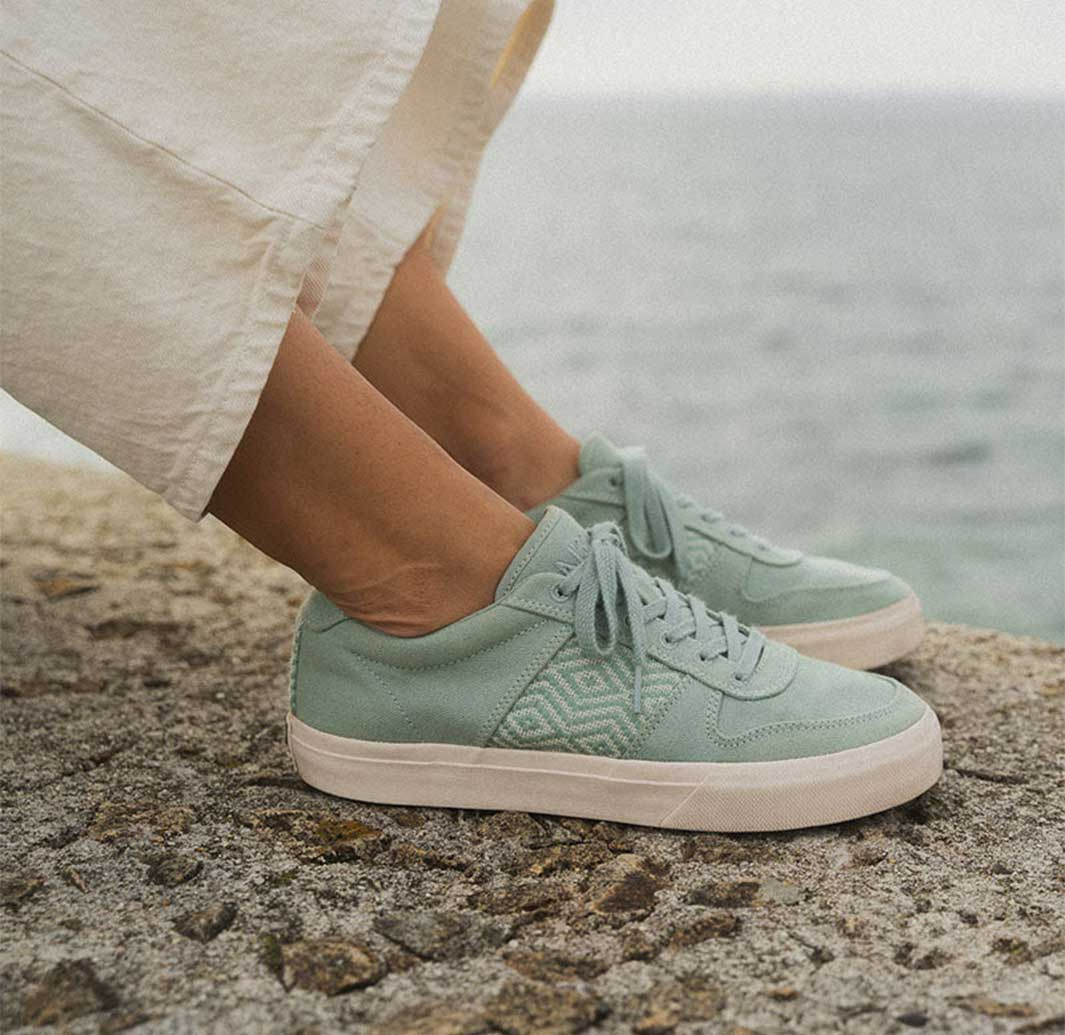 Light Blue Sneakers on Sand